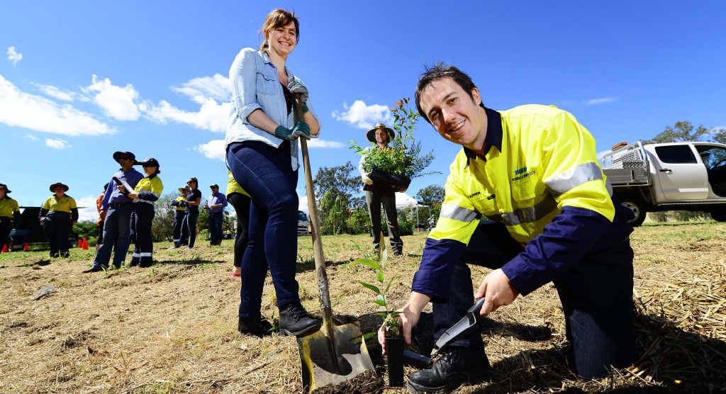 DIG IT: Melanie Ryan from the International River Foundation (left), Phil Smith (rear) from the Bremer River Fund and Darren Moore from Thiess Services, were part of a large group of staff and volunteers working on the bank of the Bundamba Creek at Tite Family Park. DIG IT: Melanie Ryan from the International River Foundation (left), Phil Smith (rear) from the Bremer River Fund and Darren Moore from Thiess Services, were part of a large group of staff and volunteers working on the bank of the Bundamba Creek at Tite Family Park.